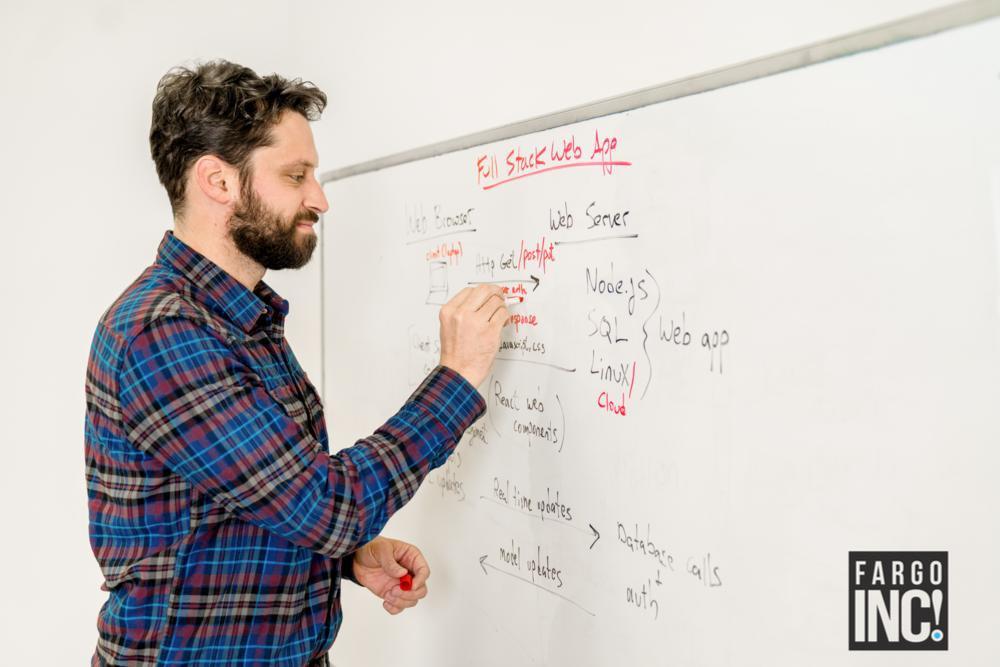 Blaine Booher is preparing to mold students into software developers.