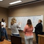uCodeGirl team working together