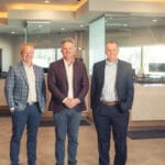 Image portraying a professional setting or business event.