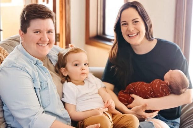 Molly Swanston (left) with her wife Alexa and their two children.
