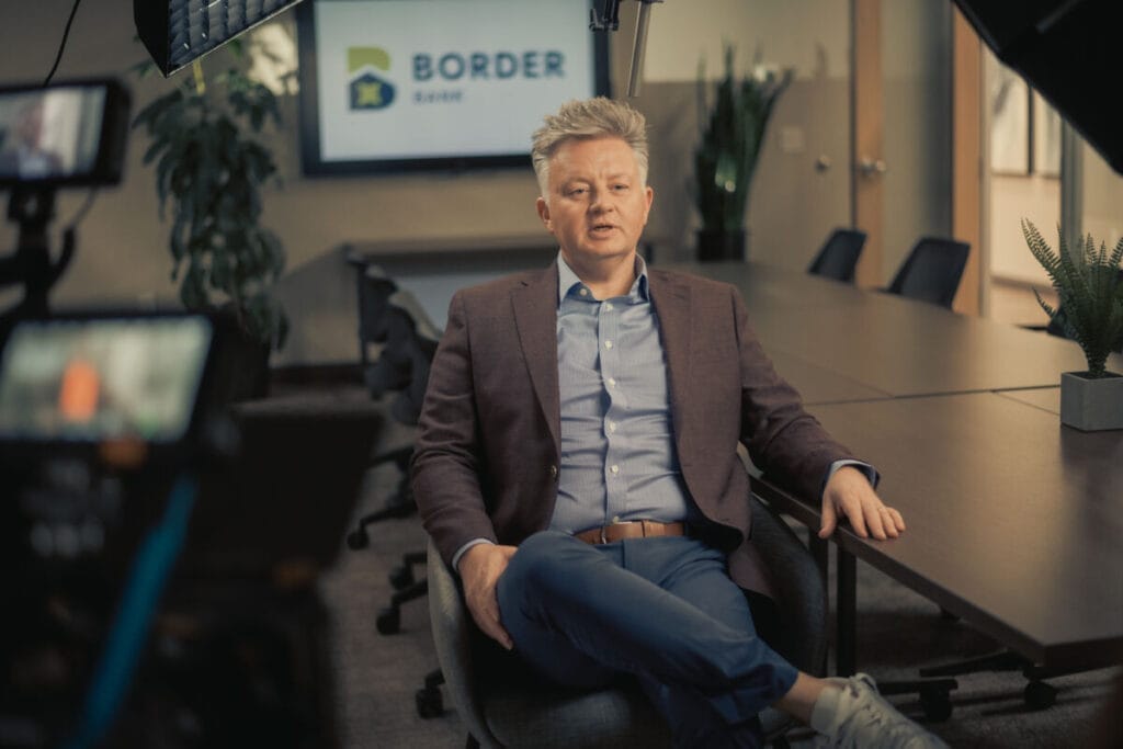 Kory Shae, CEO of Border Bank, sitting for an interview